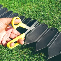 Lawn Edging Spiked Flexible Garden Border Roll For Grass Flower Beds Paths - 10m L -Draper Tool Shop lawn edging spiked flexible garden border roll for grass flower beds paths 10m l5060926021164 04c MP